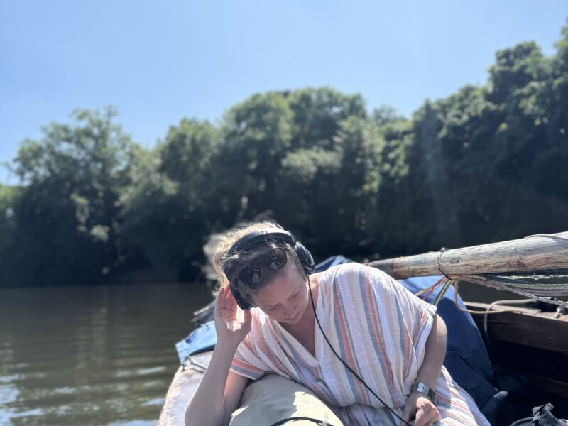 Vivienne on sailboat with hydrophone